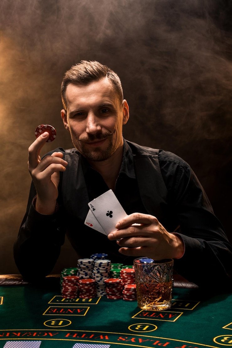 Player on mobile phone placing a roulette bet on kudustoto slot app with clear stake input field