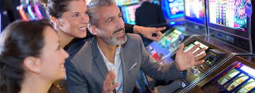 Playtech roulette wheel spinning on kudustoto slot with active bets displayed around the table layout